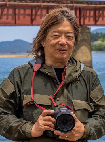 〔松本洋一氏〕