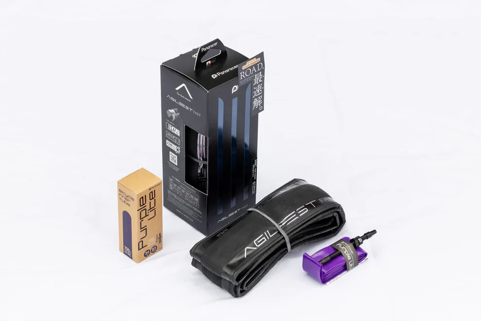 信頼のパナレーサーAGILEST FAST（28mm）にPURPLE LITE TPUチューブと妥協の無い組み合わせ  Photo: Kei Tsuji