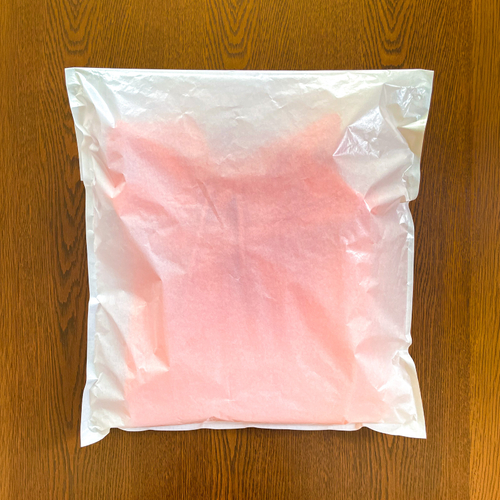 グラスパックXLにトレーナーを入れた様子