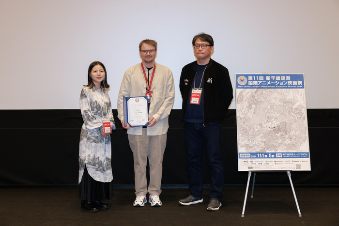 中央：ジョシュ・シャフナー氏、左：滝野 ますみ氏、右：酒井 和男氏