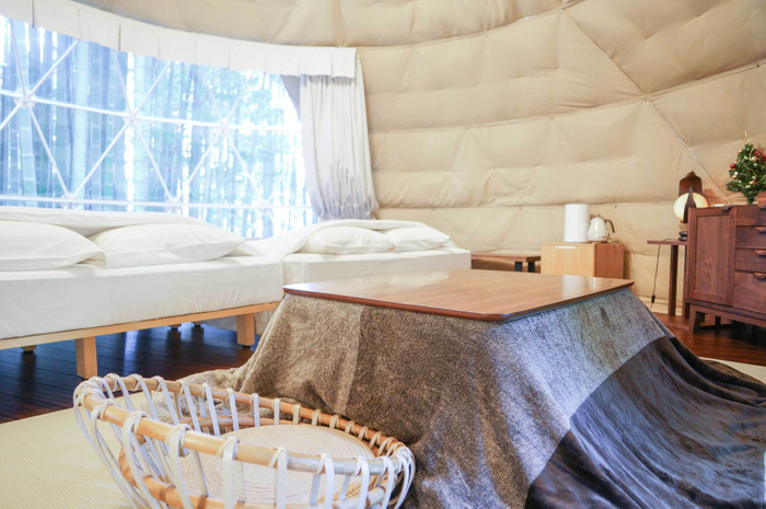 全室冷暖房完備でホテルのように快適。冬にはこたつでぬくぬくできる客室も。