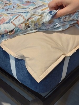 薄い敷きふとんを足すように