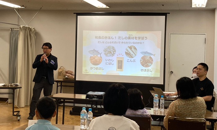 株式会社新丸正 吉田宗一郎様(写真左)