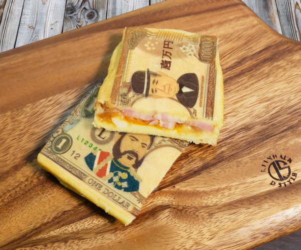 カラーカウア王&times;渋沢栄一友好記念ミートなお札パン(2)