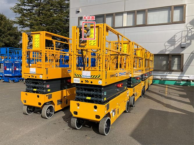 写真1：本装置を取り付けた高所作業車